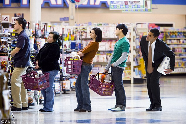 people waiting in store checkout line