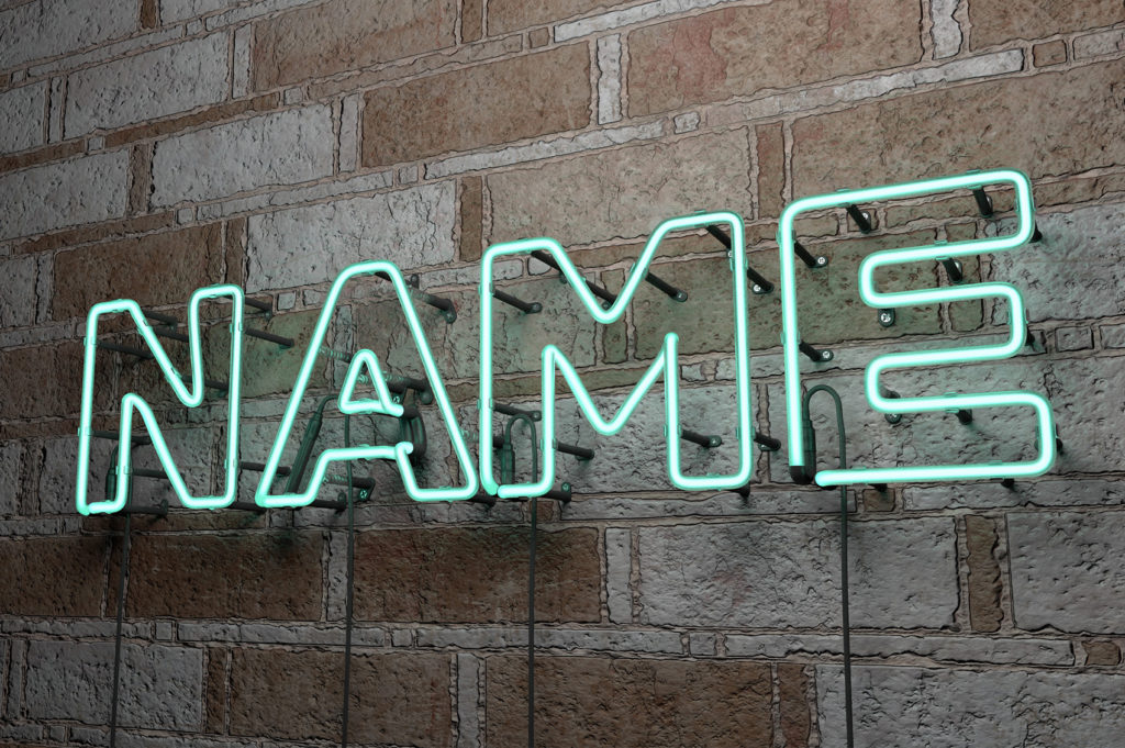 NAME - Glowing Neon Sign on stonework wall - 3D rendered royalty free stock illustration.